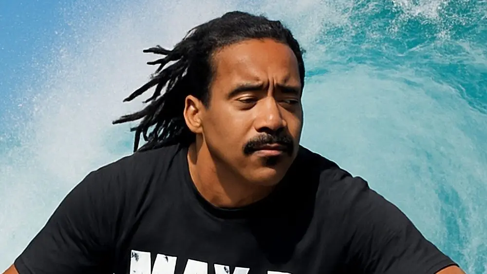 Rapper MAX B riding on an ocean wave This content was generated by an Artificial Intelligence (AI) system.