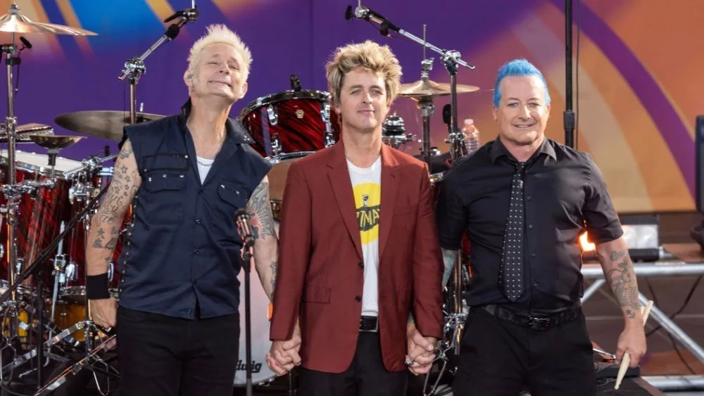 rock group Green Day (Mike Dirnt^ Billie Joe Armstrong^ Tre Cool) at ABC Good Morning America concert in Central Park in New York on July 26^ 2024