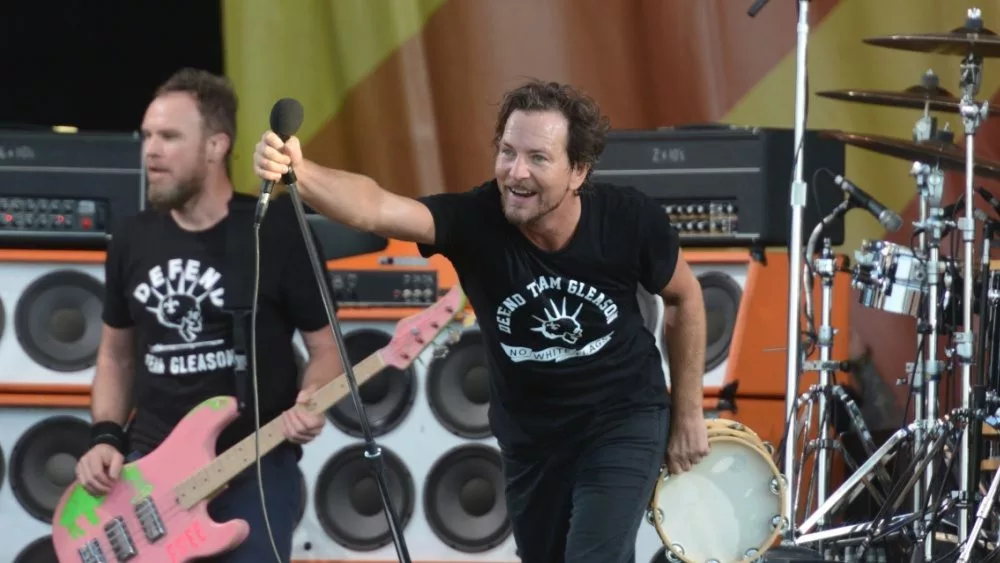 Pearl Jam with lead singer Eddie Vedder performs onstage at the 2016 New Orleans Jazz and Heritage Festival. New Orleans^ LA - April 23^ 2016