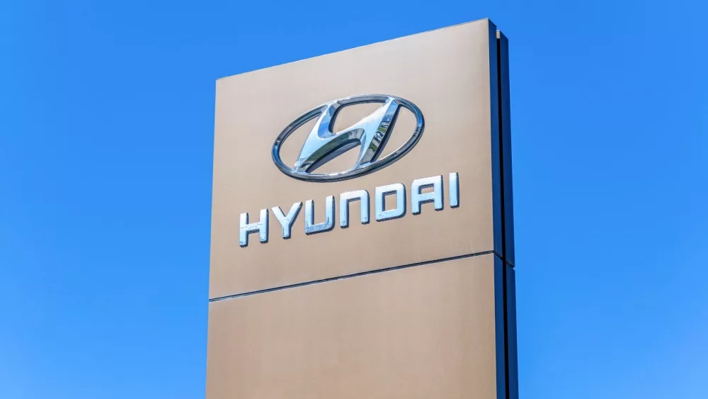Hyundai dealership sign against a blue sky bacground. Hyundai Motor Company is a South Korean multinational automotive manufacturer