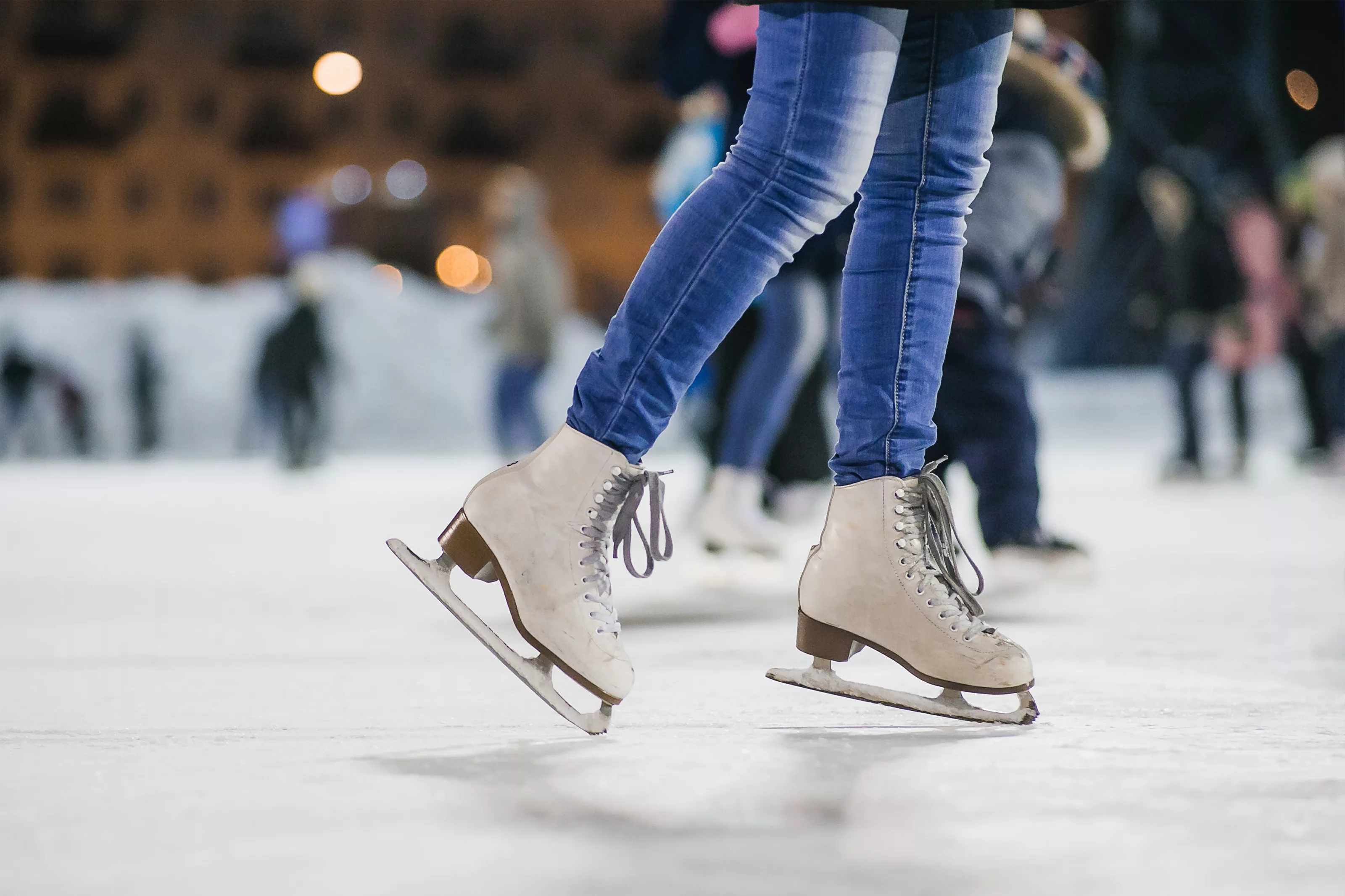 the girl on the figured skates on a skating rink