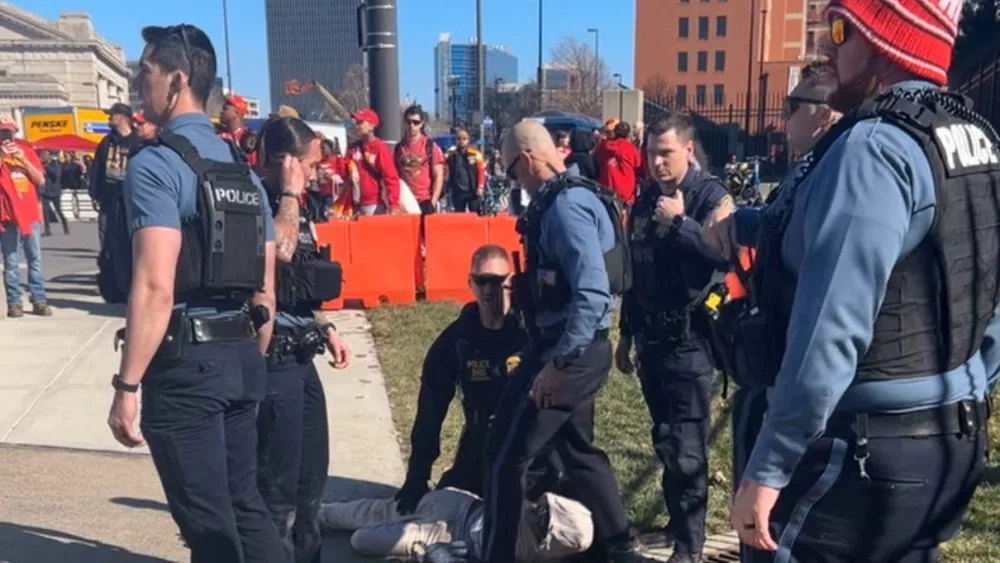 police-detain-a-person-following-a-shooting-near-an-outdoor-celebration-of-the-nfl-champion-chiefs-super-bowl-victory-in-kansas-city