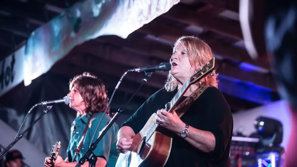 Indigo Girls duo Amy Ray and Emily Sailers singing on stage at Wild Goose Festival on July 9^ 2016 in Hot Springs^ NC^ USA.