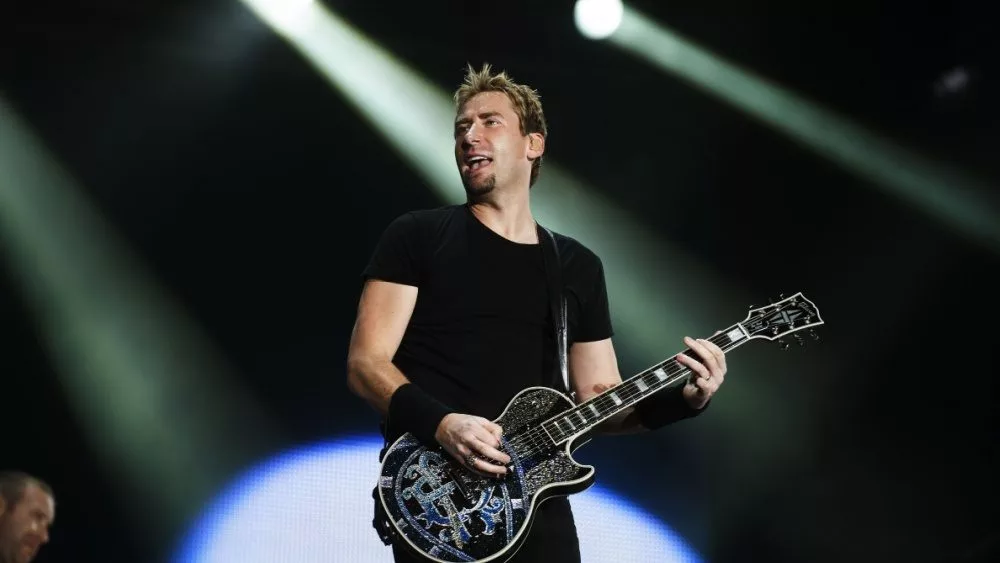 Chad Kroeger^ lead vocalist of the Canadian band Nickelback^ performs during the Rock in Rio 2013 concert^ on September 20^ 2013 in Rio de Janeiro^ Brazil.