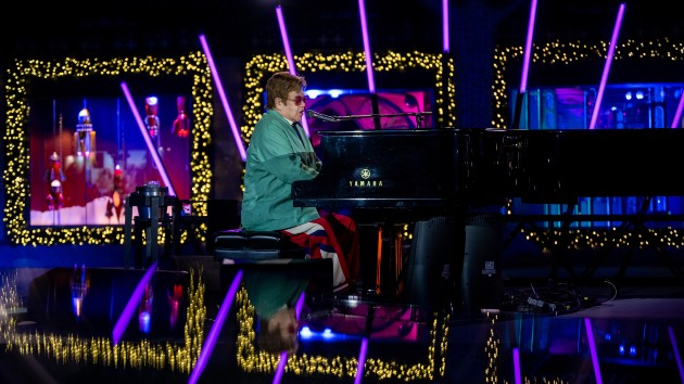 getty_eltonjohnplaysatsaks_120722