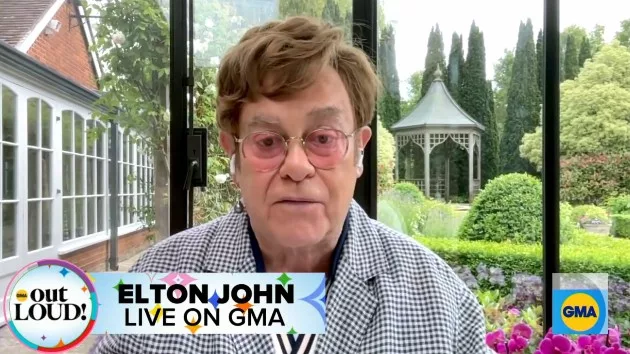 m_eltonjohnscreenshotgma_060523456629