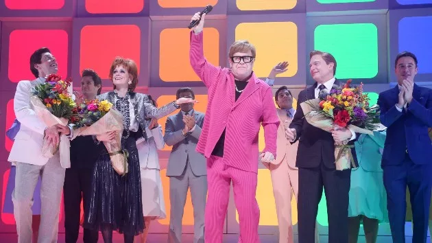 getty_eltonjohnandcastoftammyfaye__111924203071