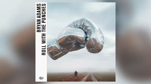 m_bryanadamsrollwiththepunches_070725827149