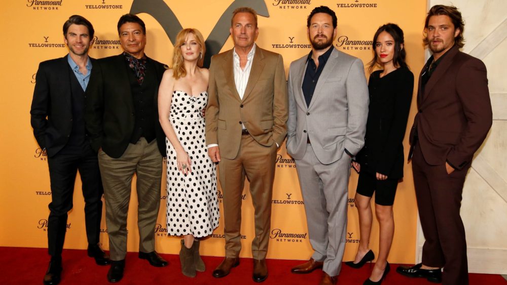 cast-members-bentley-birmingham-reilly-costner-hauser-asbille-and-grimes-pose-at-a-premiere-party-for-season-2-of-the-television-series-yellowstone-in-los-angeles-2