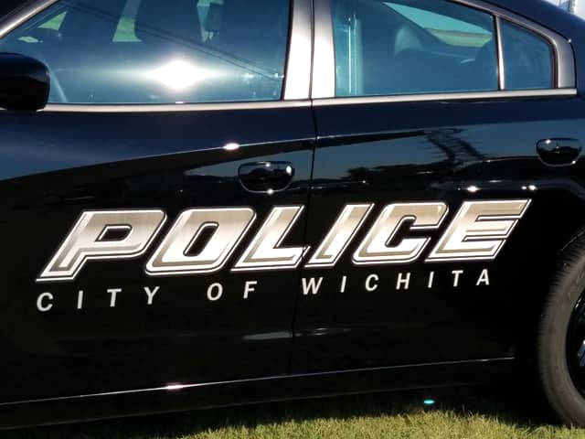 Woman found unconscious in roadway in northeast Wichita