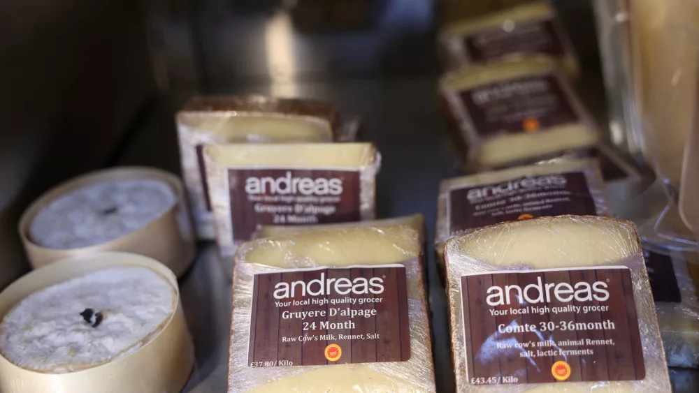 a-range-of-cheese-is-displayed-at-gourmet-grocery-store-andreas-in-london