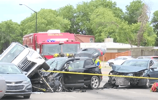 Two injured, two in custody after east Wichita crash