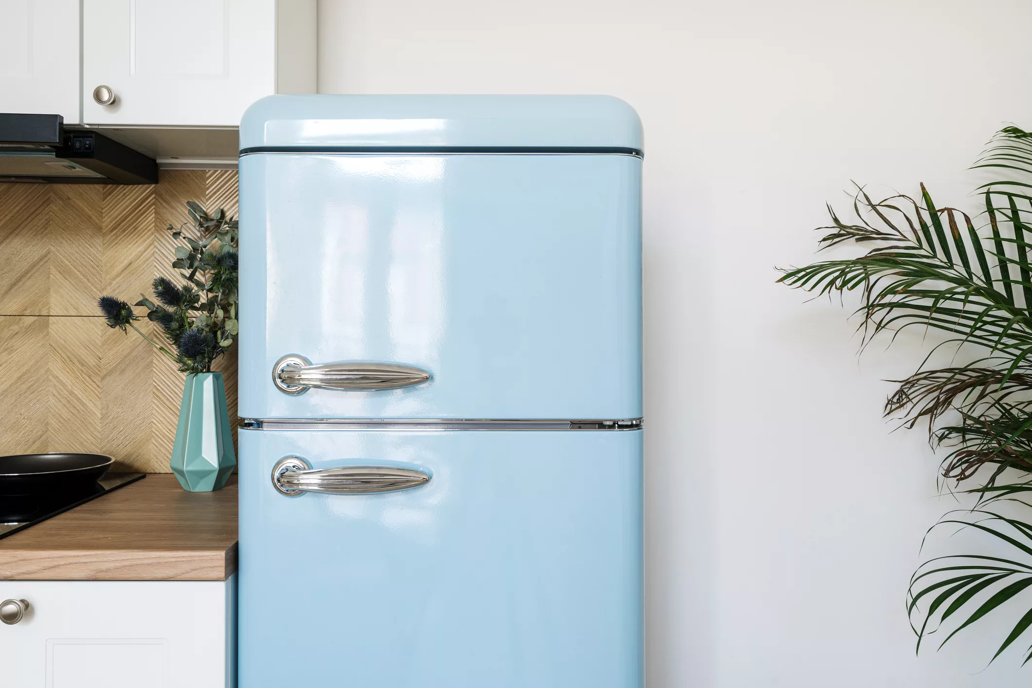 blue-refrigerator-with-stainless-steel-handles-in-retro-style-in-kitchen