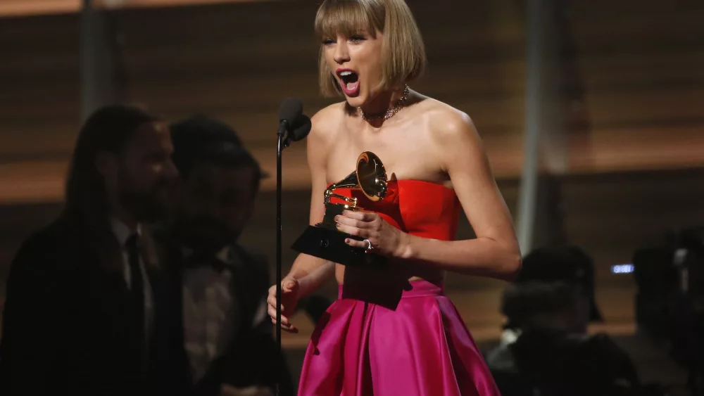 taylor-swift-accepts-the-award-for-album-of-the-year-for-1989-at-the-58th-grammy-awards-in-los-angeles