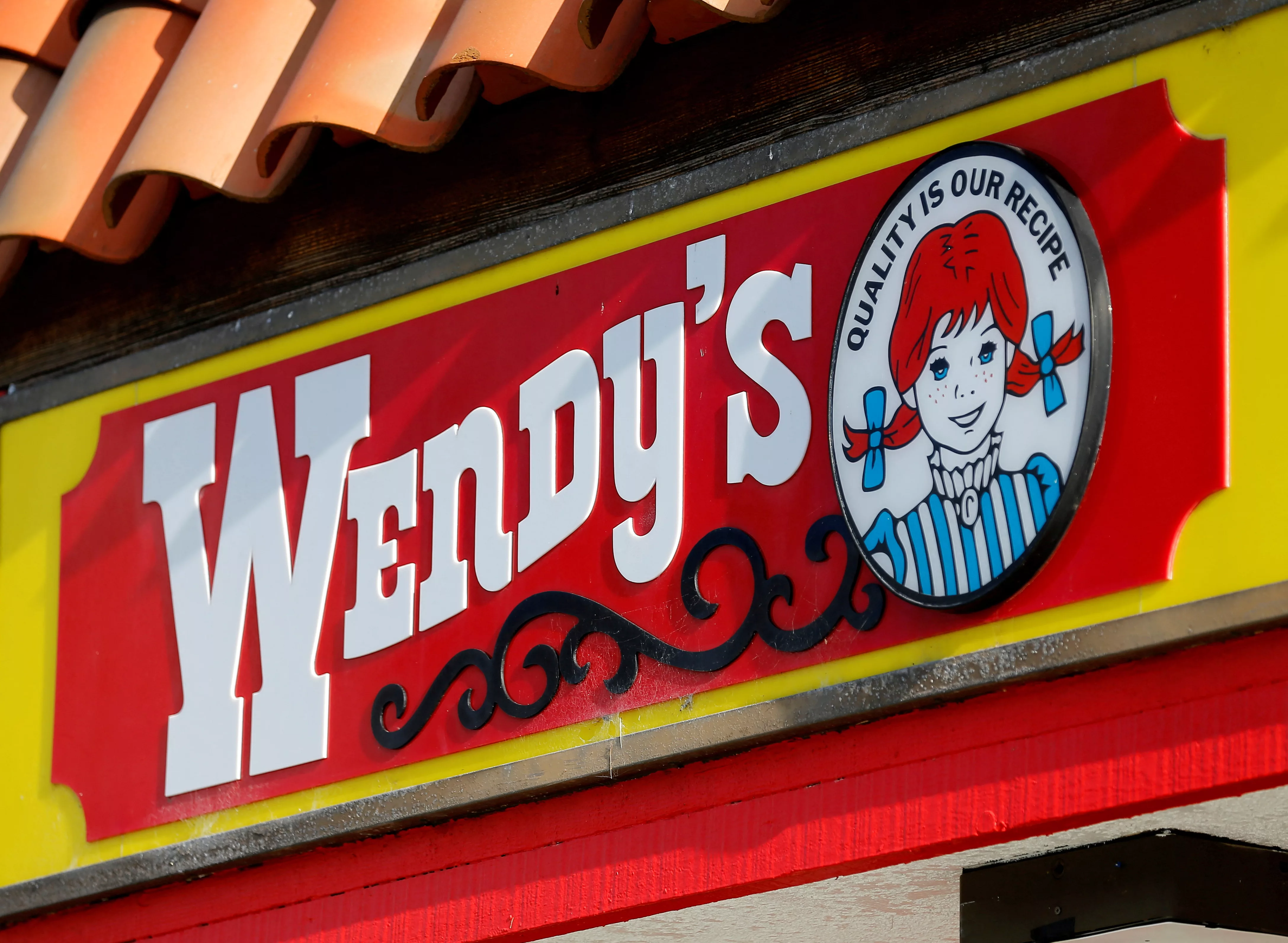 file-photo-a-wendys-sign-and-logo-are-shown-at-one-of-the-companys-restaurant-in-encinitas-california