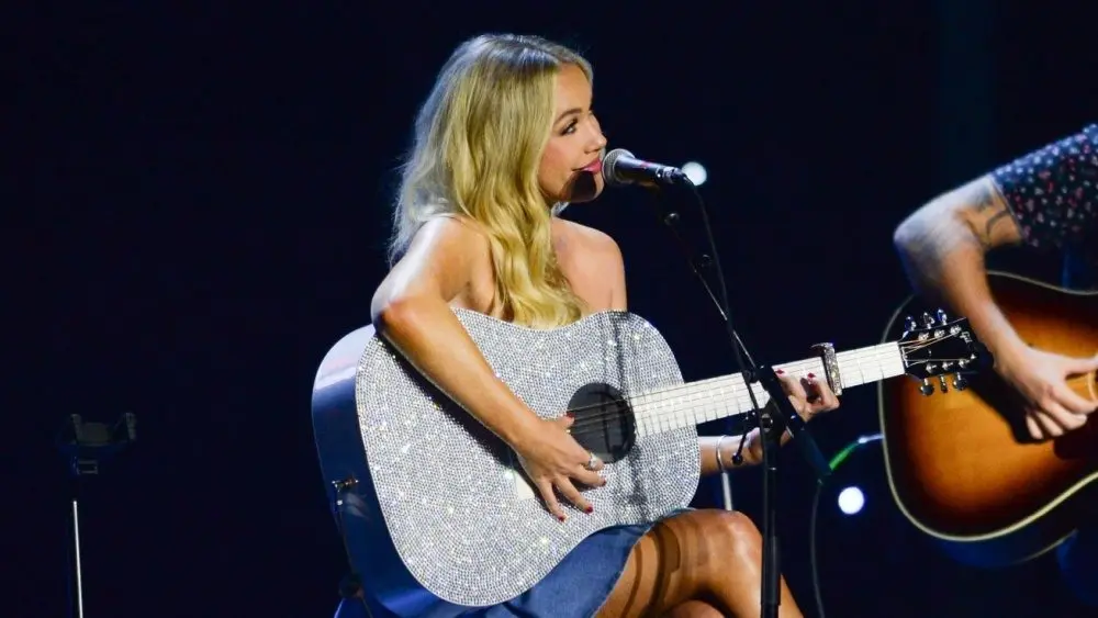 Megan Moroney performs in Hollywood^ Florida on November 14^ 2024 as part of Audacy’s Stars and Strings benefit concert.