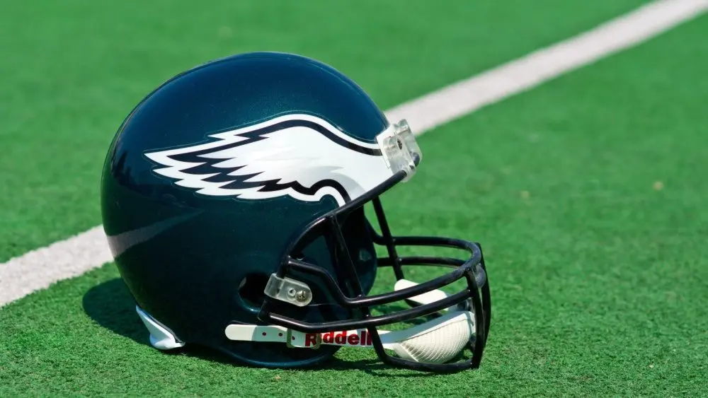 Philadelphia eagles NFL club helmet on the green playing field ^ product shot ZAGREB ^ CROATIA - 13 AUGUST 2015