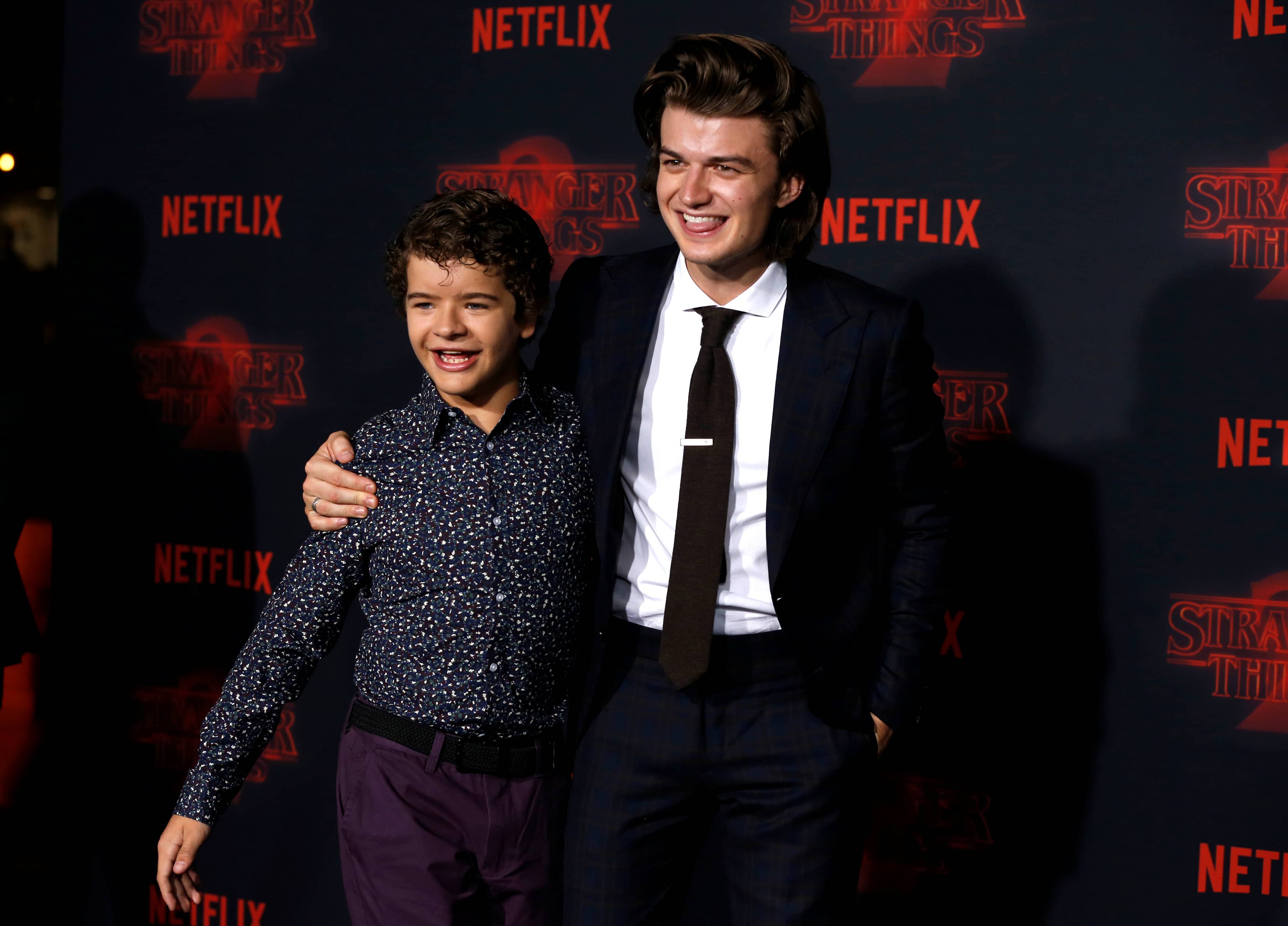 cast-members-keery-and-matarazzo-pose-at-the-premiere-for-the-second-season-of-the-television-series-stranger-things-in-los-angeles