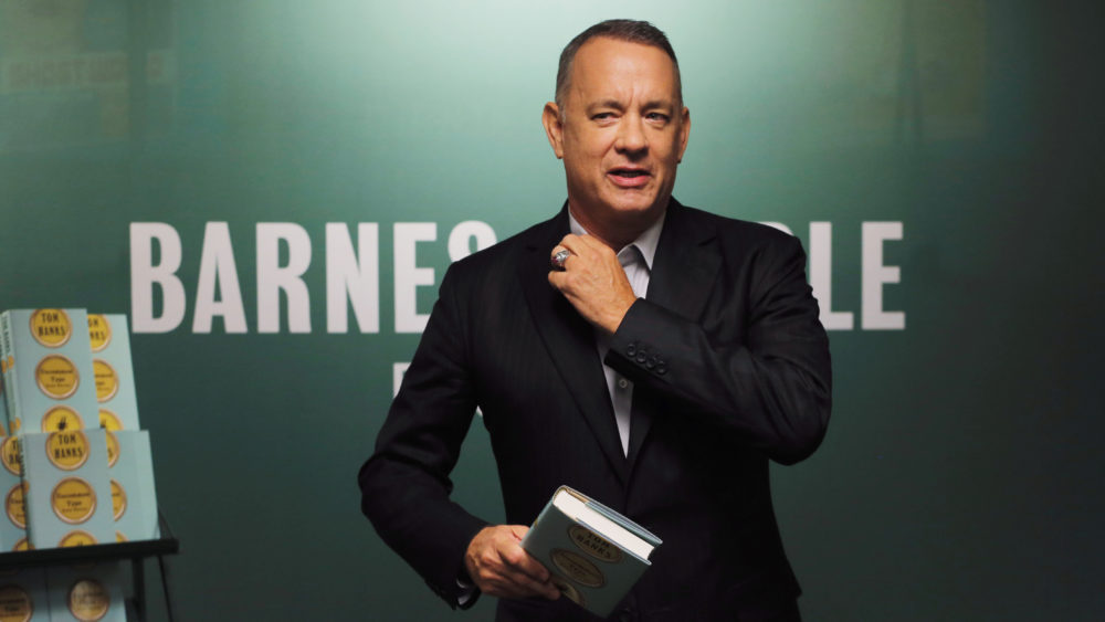 actor-tom-hanks-holds-a-copy-of-his-book-at-a-promotional-event-for-uncommon-type-some-stories-in-new-york