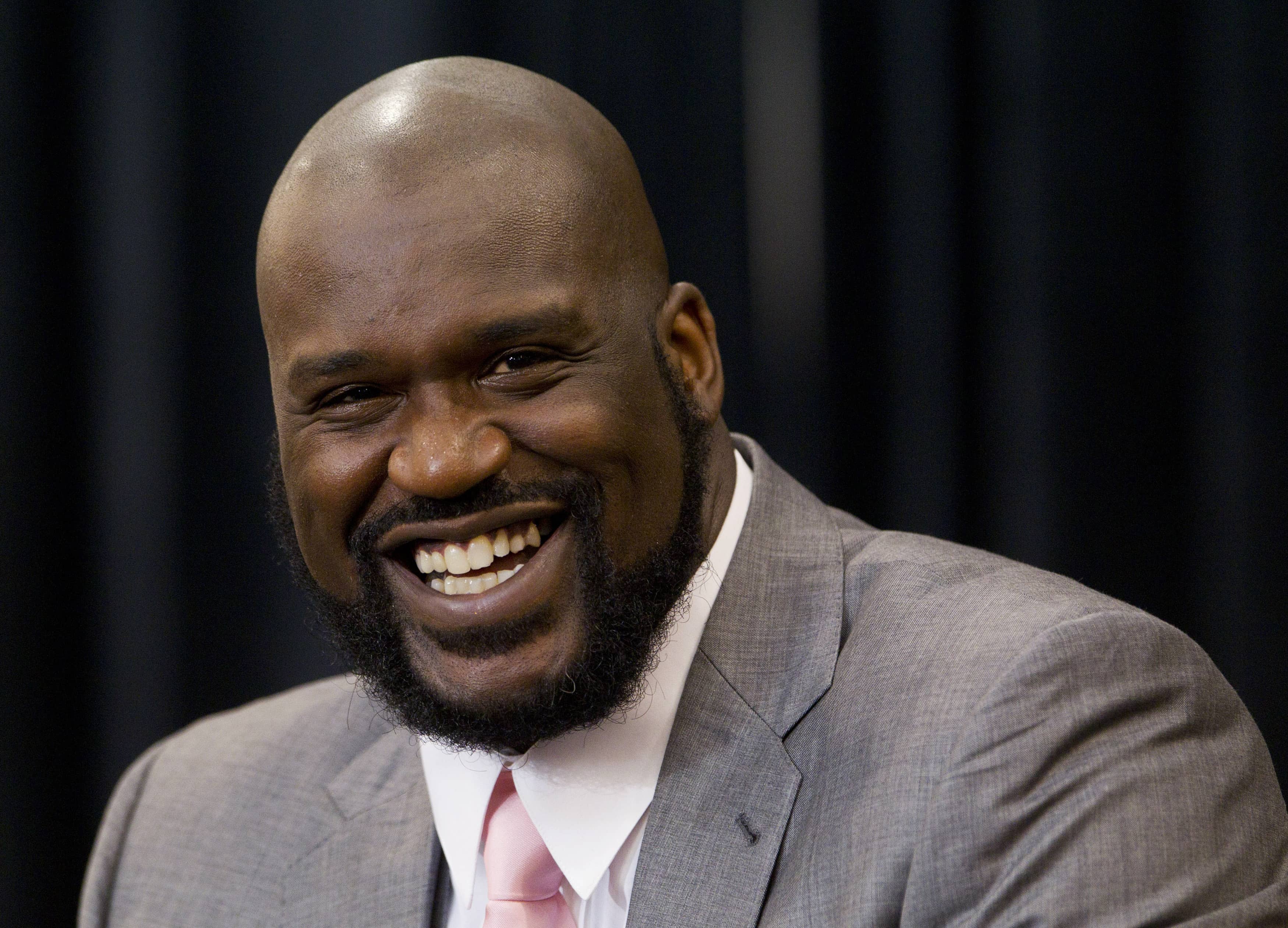 shaquille-oneal-laughs-as-he-announces-his-retirement-from-nba-at-a-news-conference-in-windermere