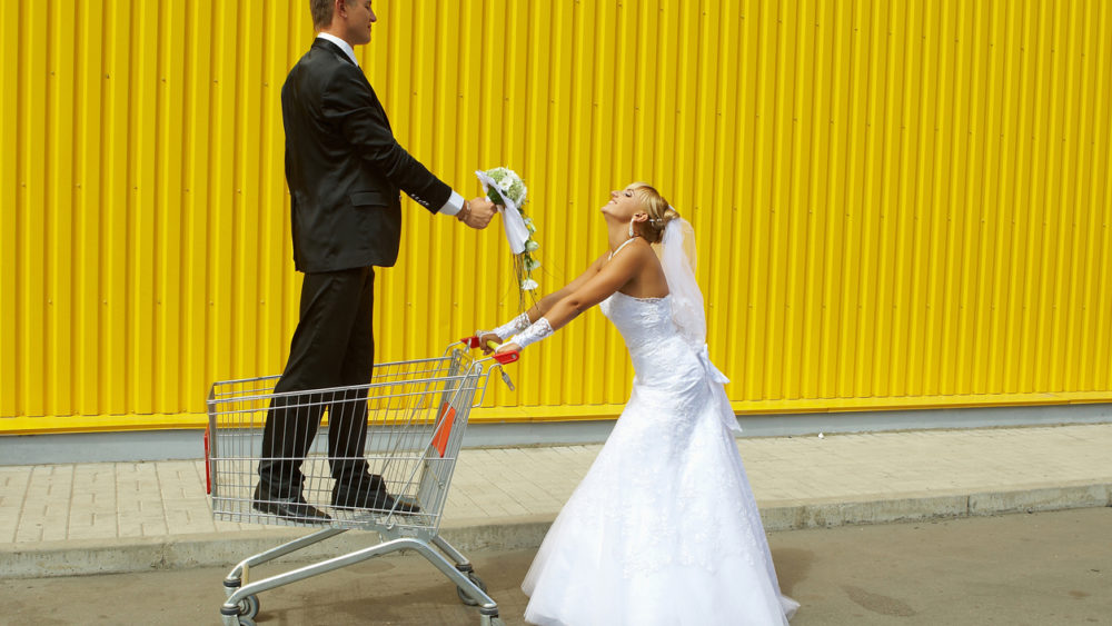 bride-and-groom-playing-with-a-basket-of-supermarket