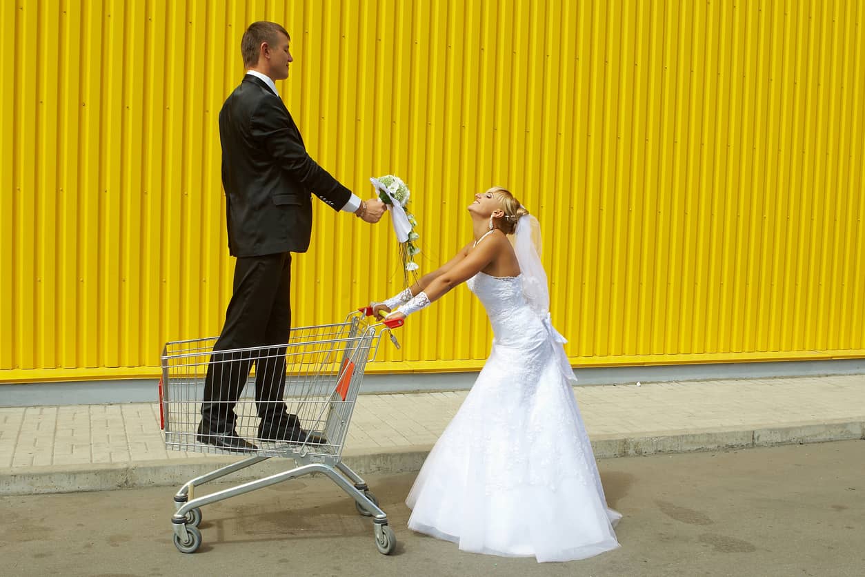 bride-and-groom-playing-with-a-basket-of-supermarket