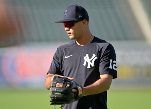 New York Yankees' Isiah Kiner-Falefa practices on the field at the