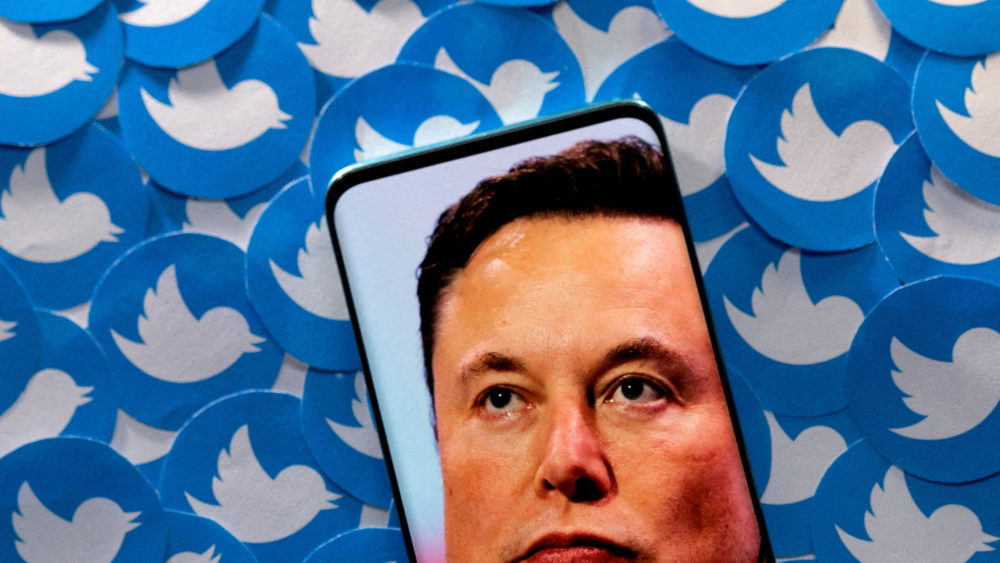 file-photo-illustration-shows-elon-musk-image-on-smartphone-and-printed-twitter-logos
