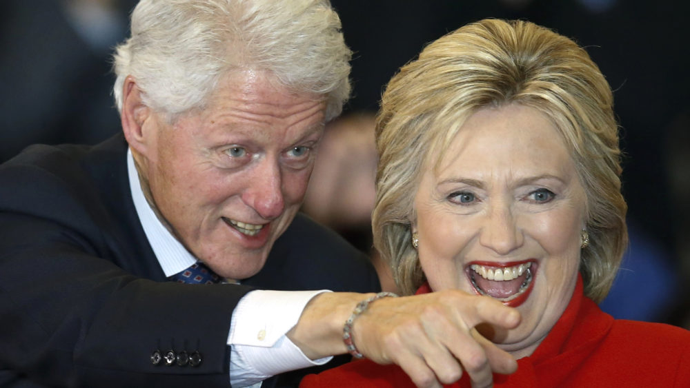 democratic-u-s-presidential-candidate-hillary-clinton-laughs-as-she-celebrates-with-her-husband-former-president-bill-clinton-at-her-caucus-night-rally-in-des-moines