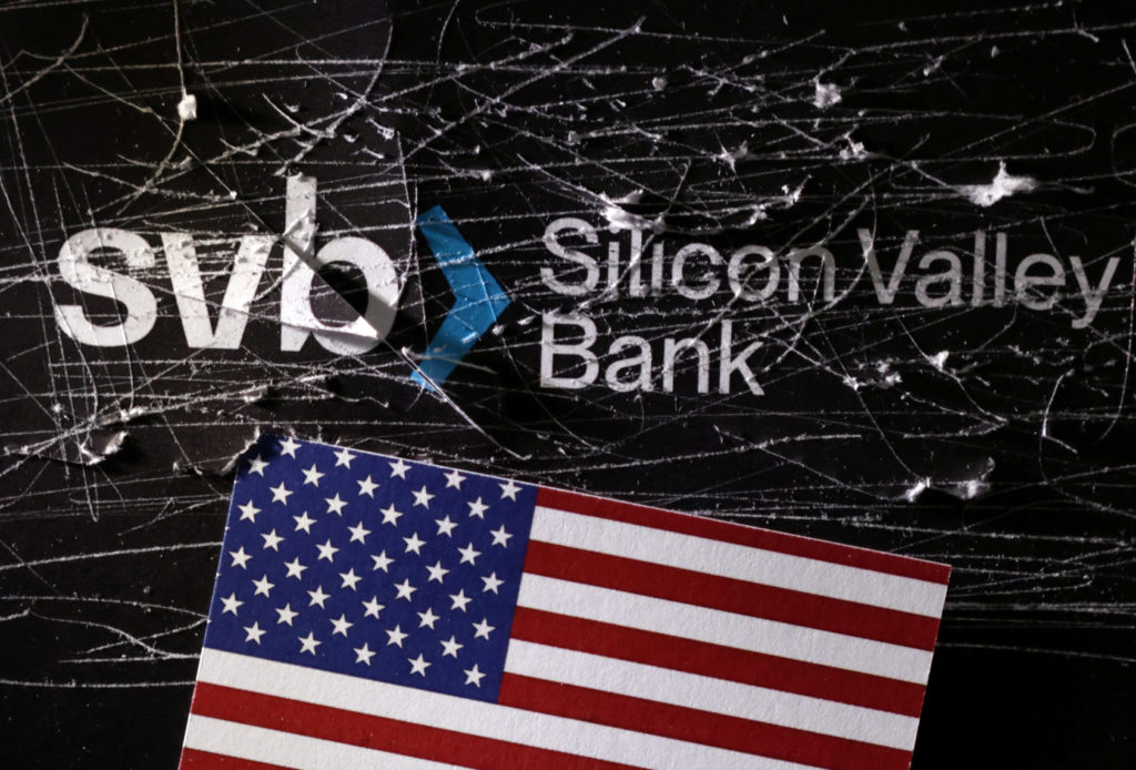 illustration-shows-destroyed-svb-silicon-valley-bank-logo-and-u-s-flag