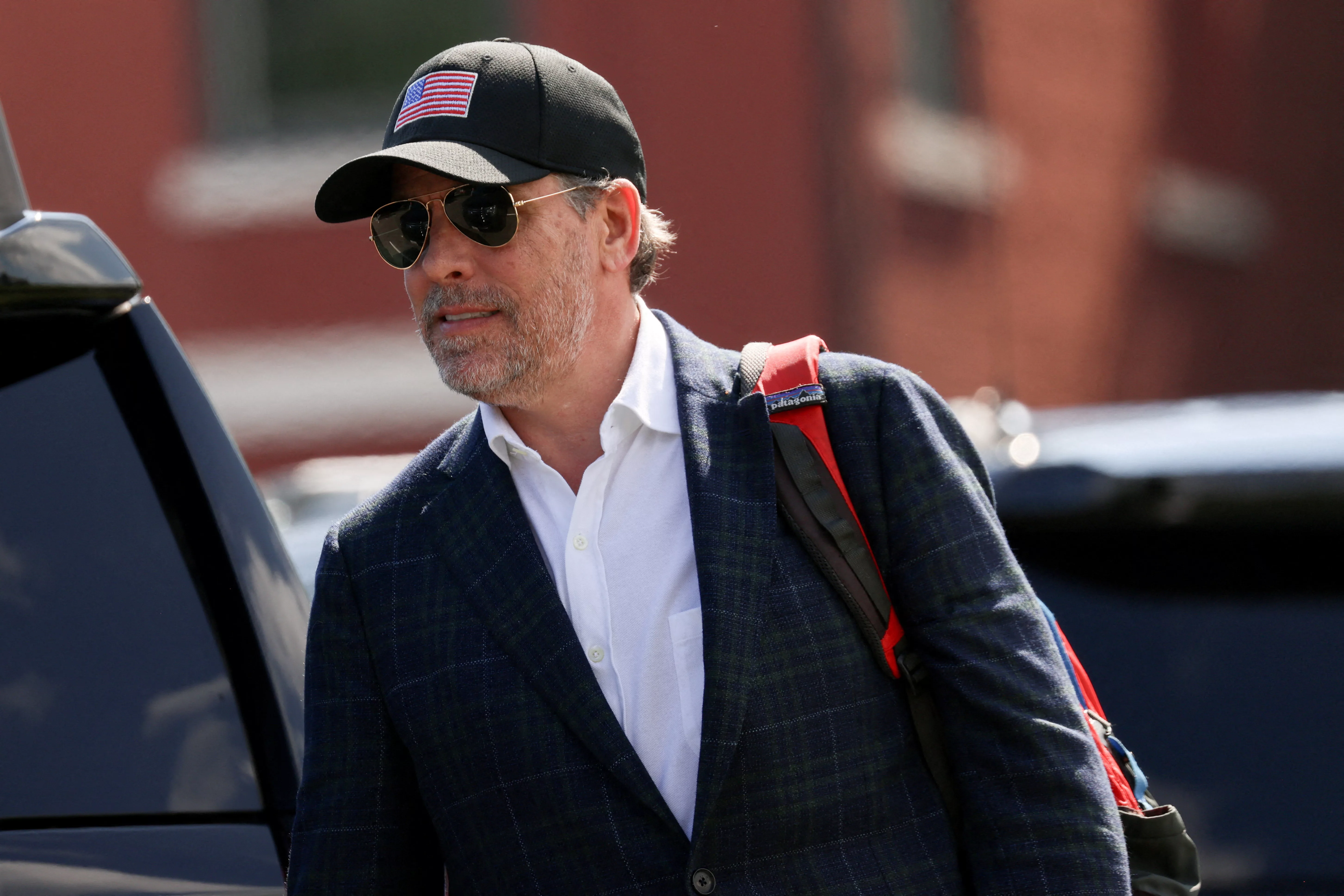 file-photo-hunter-biden-walks-to-the-motorcade-after-arriving-at-fort-mcnair