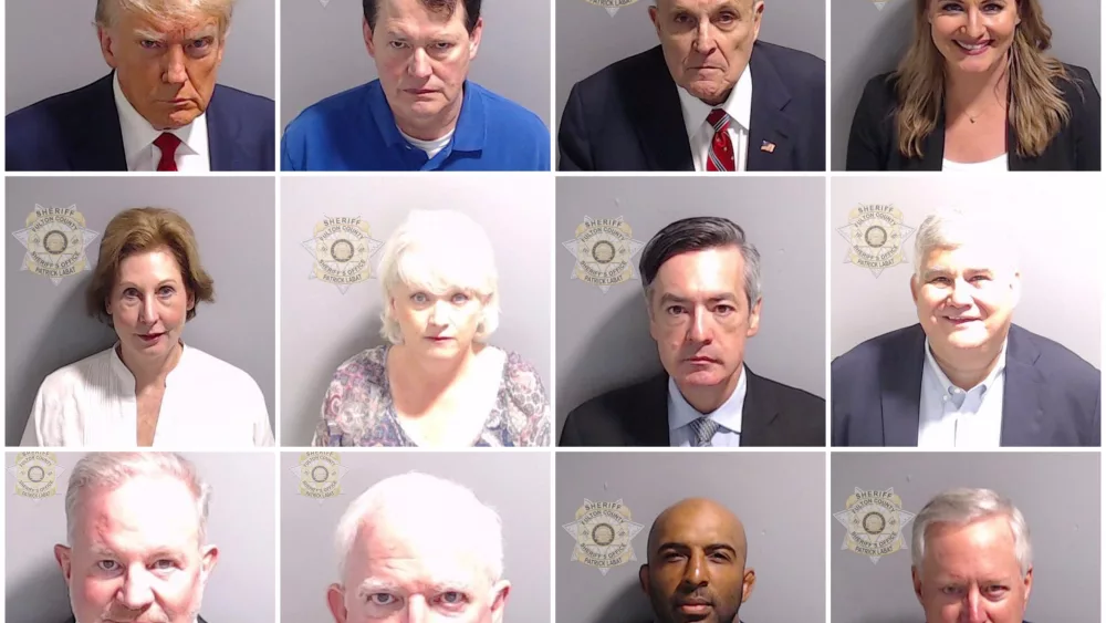 a-combination-picture-shows-police-booking-mugshots-of-former-u-s-president-trump-and-11-of-the-18-people-indicted-with-him