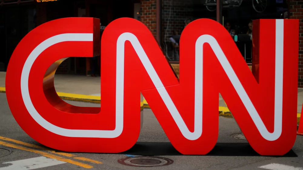 the-cnn-logo-stands-outside-the-venue-of-the-second-democratic-2020-u-s-presidential-candidates-debate-in-the-fox-theater-in-detroit