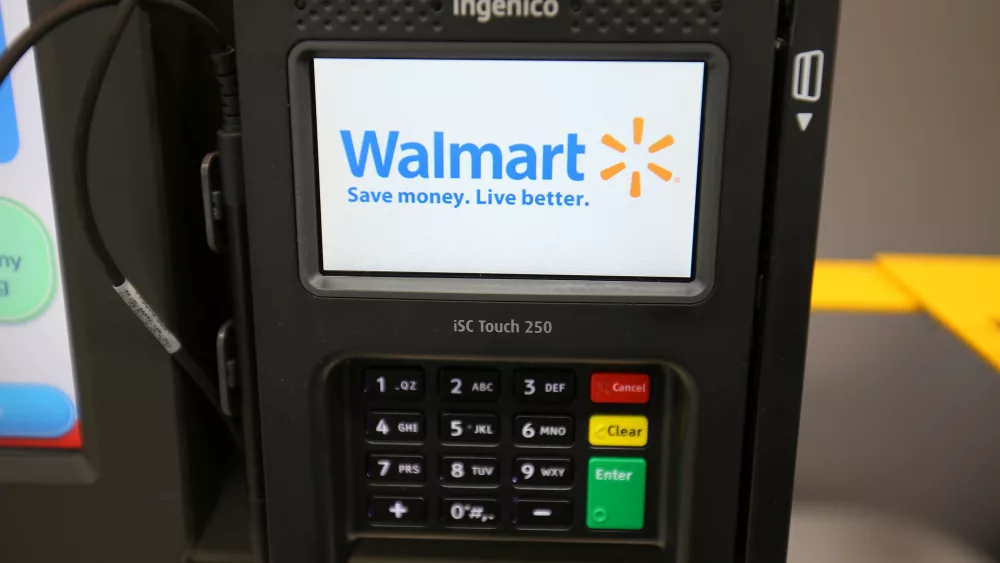 a-credit-card-terminal-is-shown-at-a-self-checkout-kiosk-for-a-new-walmart-super-center-prior-to-its-opening-in-compton-california