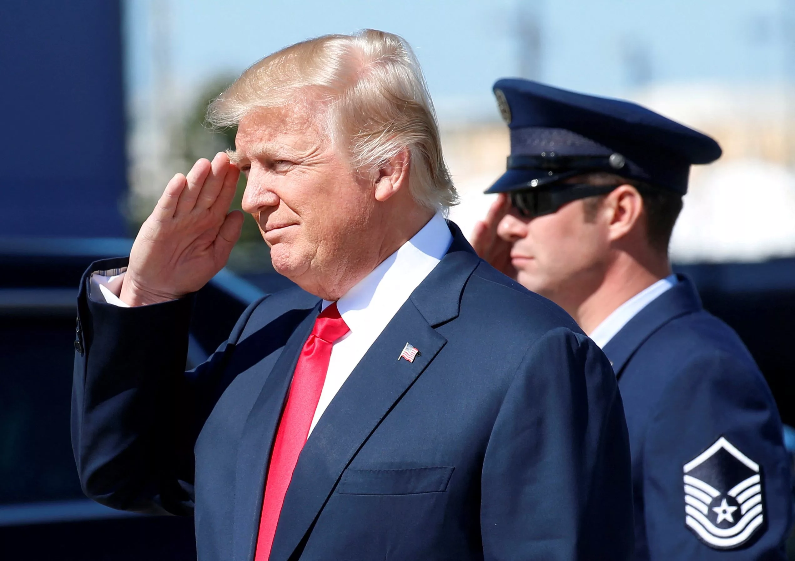 file-photo-u-s-president-trump-returns-a-salute-as-he-steps-from-air-force-one-to-tour-the-boeing-south-carolina-facility-in-north-charleston