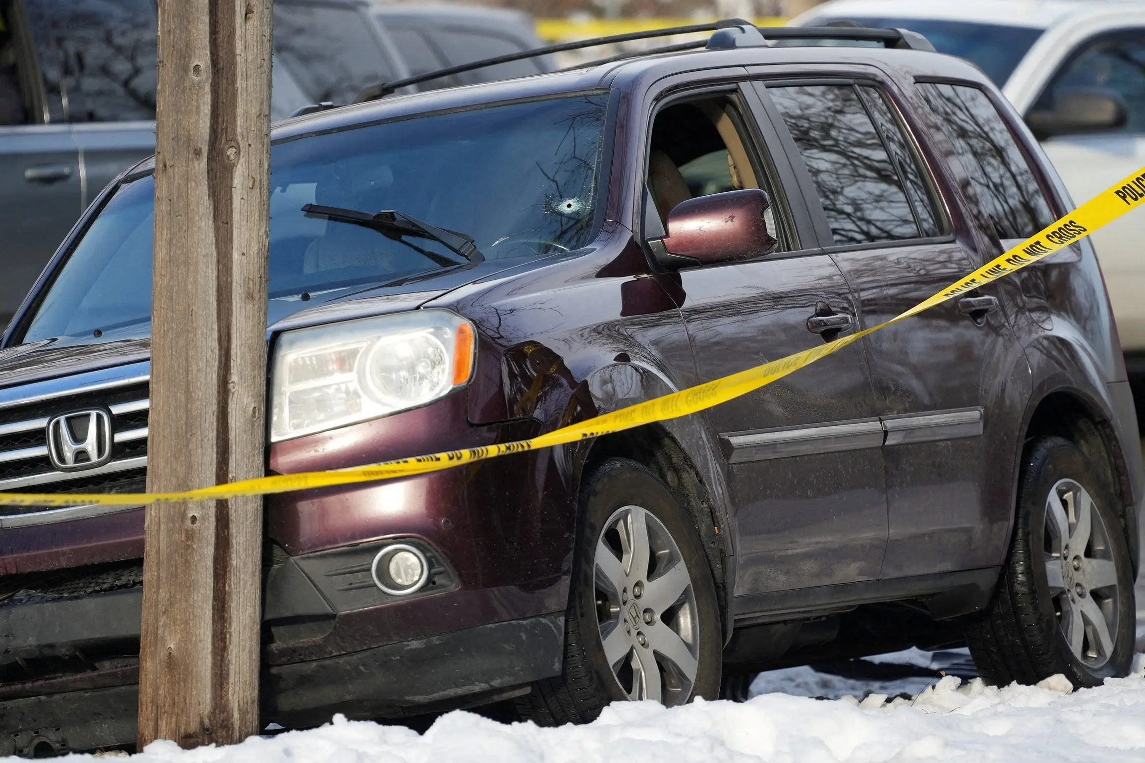 members-of-u-s-immigration-and-customs-enforcement-ice-stand-guard-after-a-driver-of-a-vehicle-was-shot-in-minneapolis