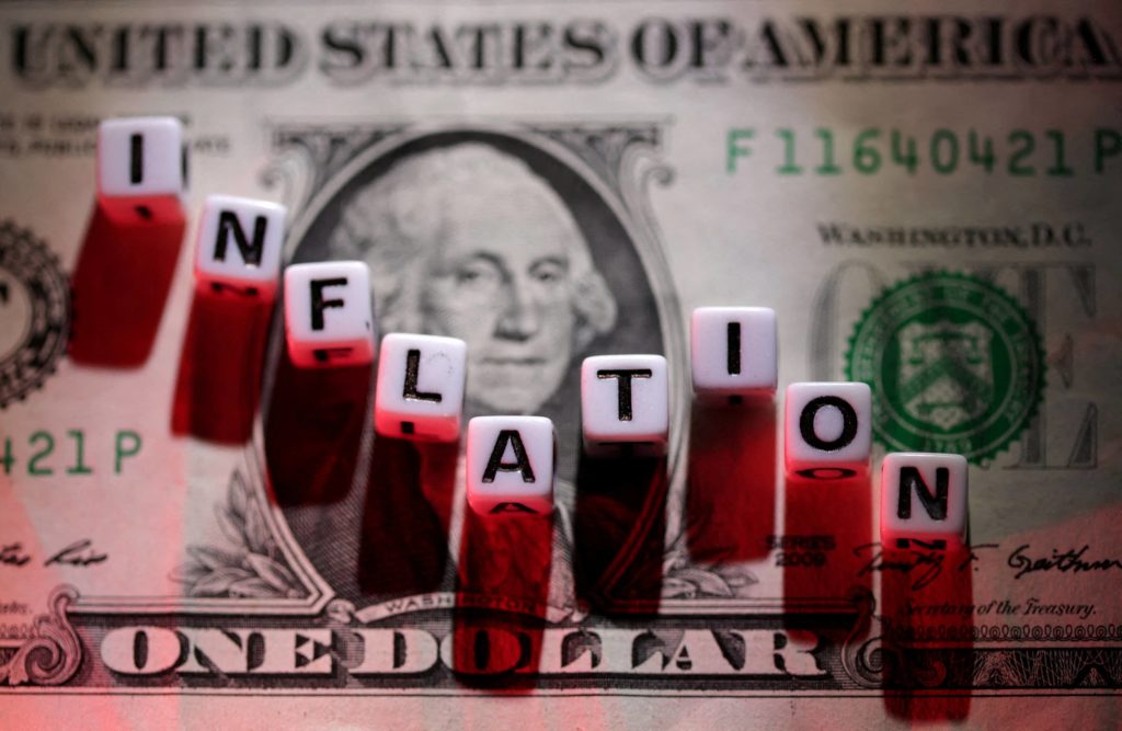 file-photo-illustration-shows-plastic-letters-arranged-to-read-inflation-are-placed-on-u-s-dollar-banknote