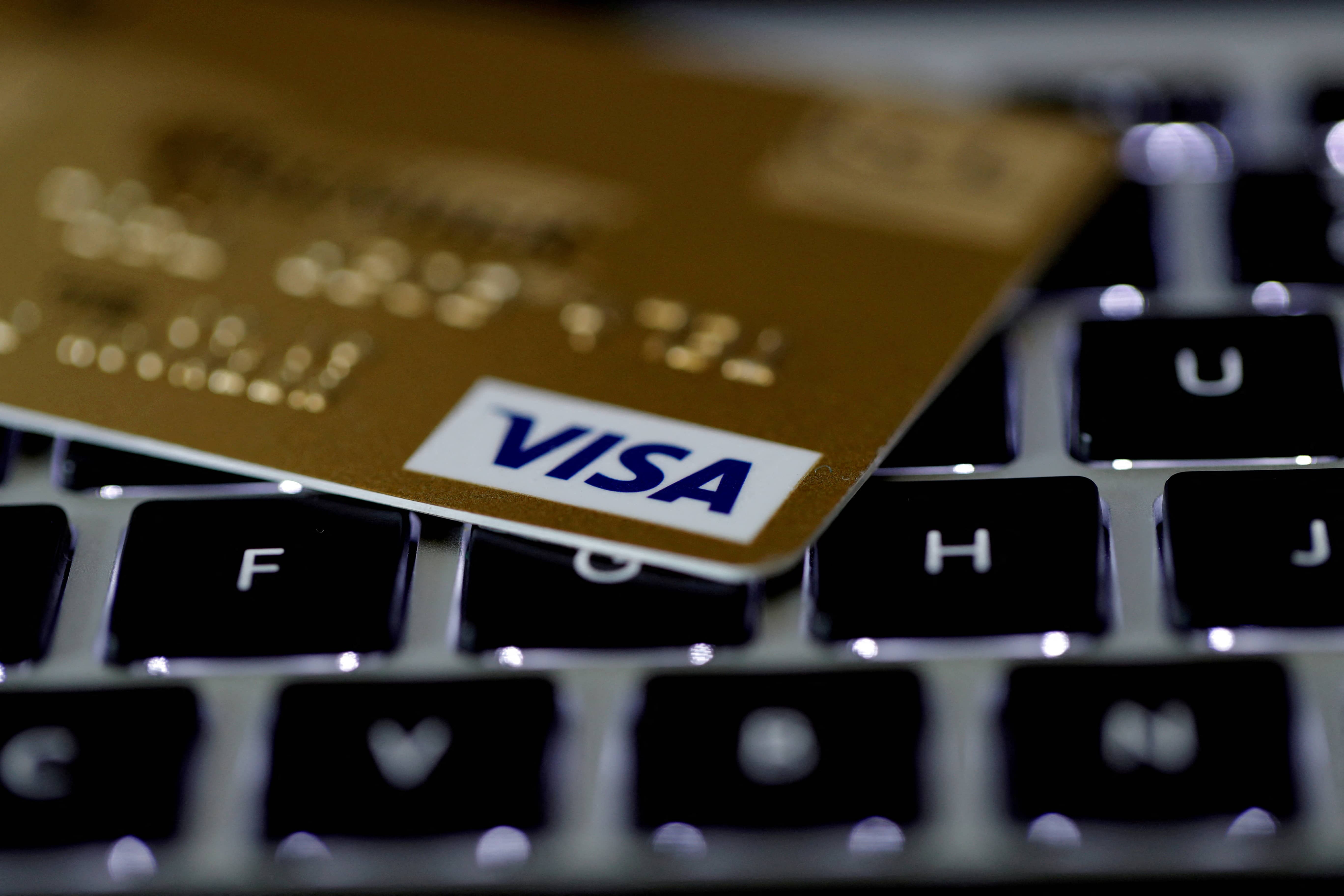 file-photo-a-visa-credit-card-is-seen-on-a-computer-keyboard-in-this-picture-illustration