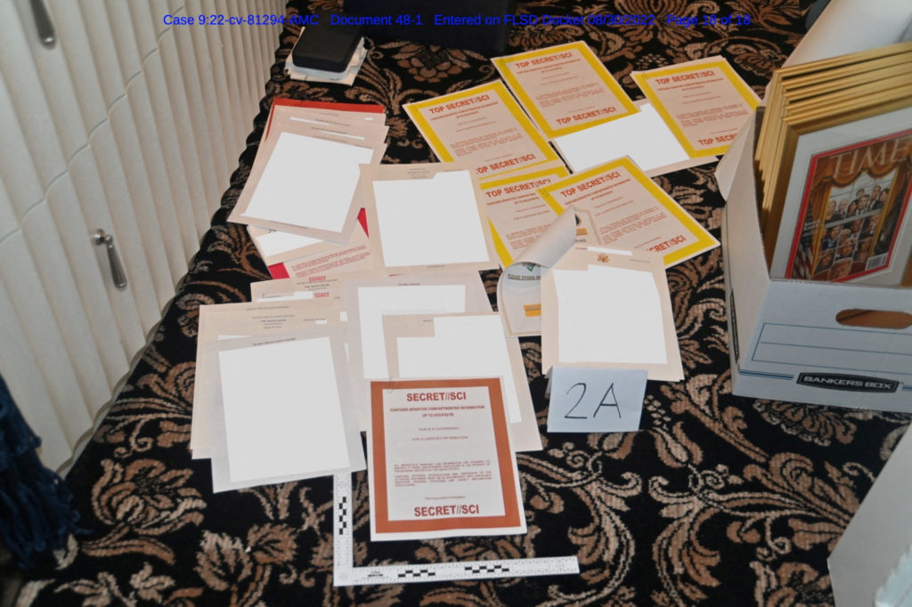 a-redacted-fbi-photograph-of-documents-and-classified-cover-sheets-recovered-from-a-container-stored-in-former-u-s-president-donald-trumps-florida-estate