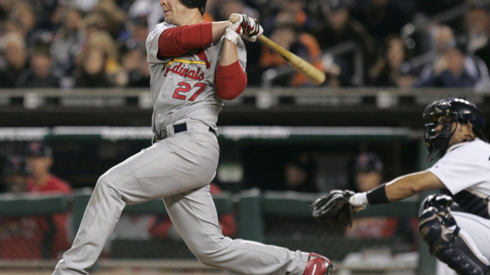 st-louis-cardinals-scott-rolen-hits-home-run-against-detroit-tigers-in-game-1-in-major-league-baseballs-world-series-in-detroit