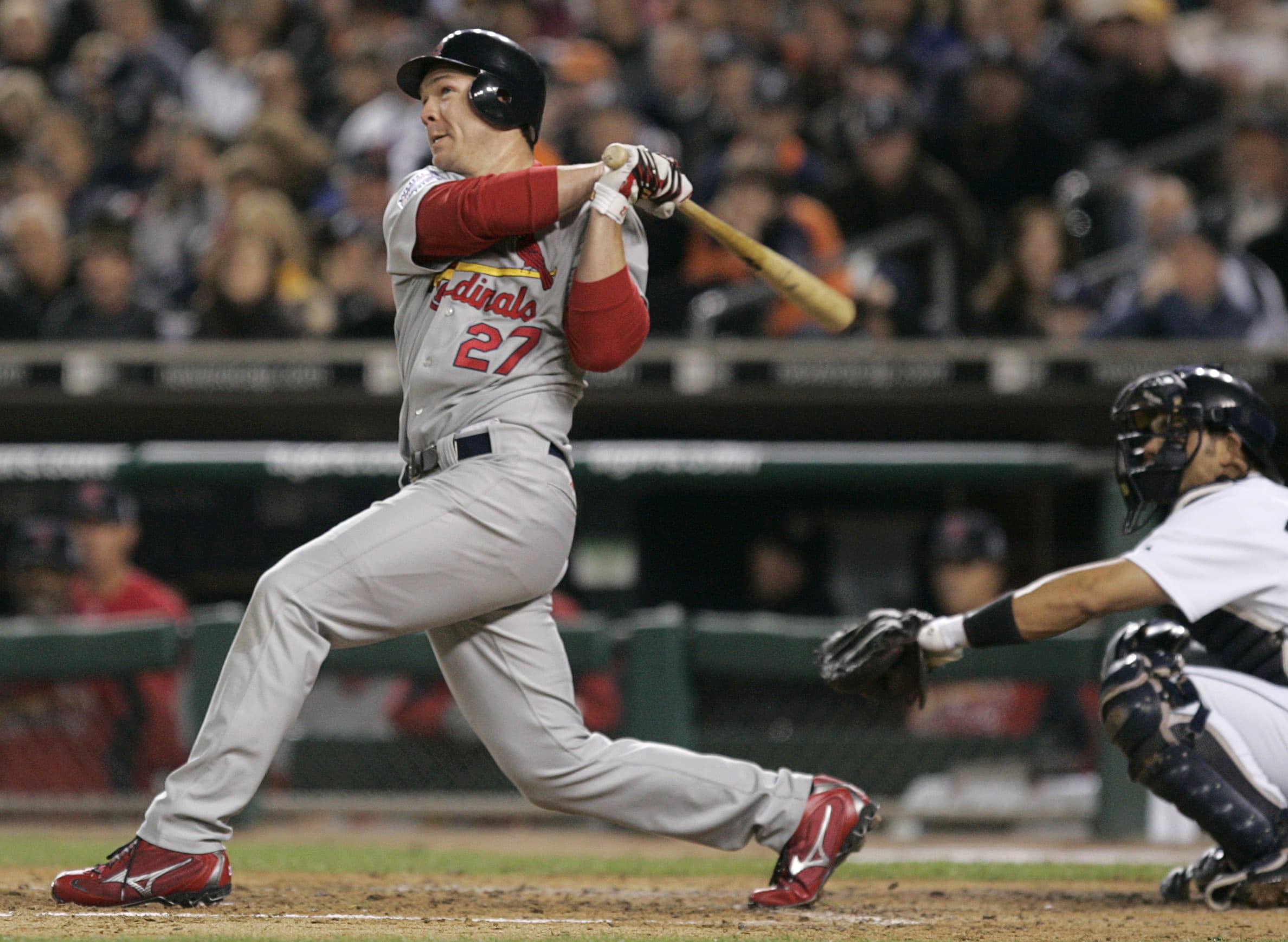 st-louis-cardinals-scott-rolen-hits-home-run-against-detroit-tigers-in-game-1-in-major-league-baseballs-world-series-in-detroit