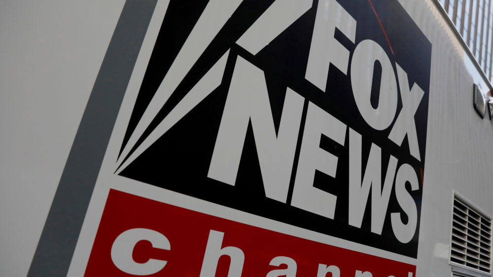 file-photo-file-photo-a-fox-news-channel-sign-is-seen-on-a-television-vehicle-outside-the-news-corporation-building-in-new-york-city-in-new-york