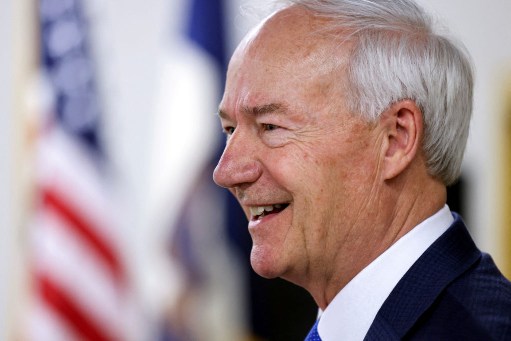 file-photo-former-arkansas-governor-and-republican-presidential-candidate-asa-hutchinson-greets-people-in-des-moines