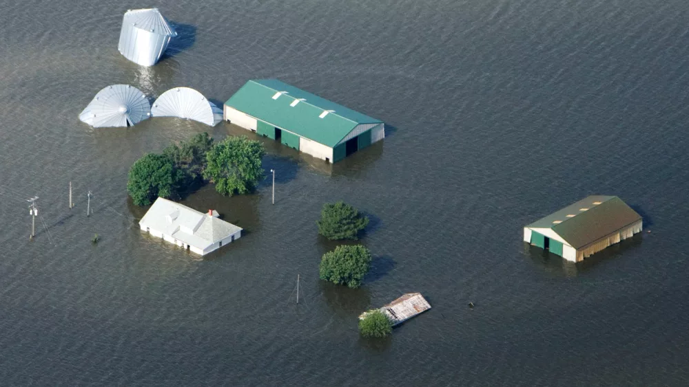 file-photo-an-aerial-view-of-a-farm-north-of-council-bluffs-iowa-submerged-in-missouri-river-flood-waters