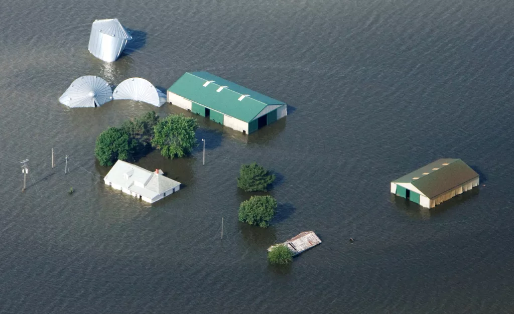 file-photo-an-aerial-view-of-a-farm-north-of-council-bluffs-iowa-submerged-in-missouri-river-flood-waters
