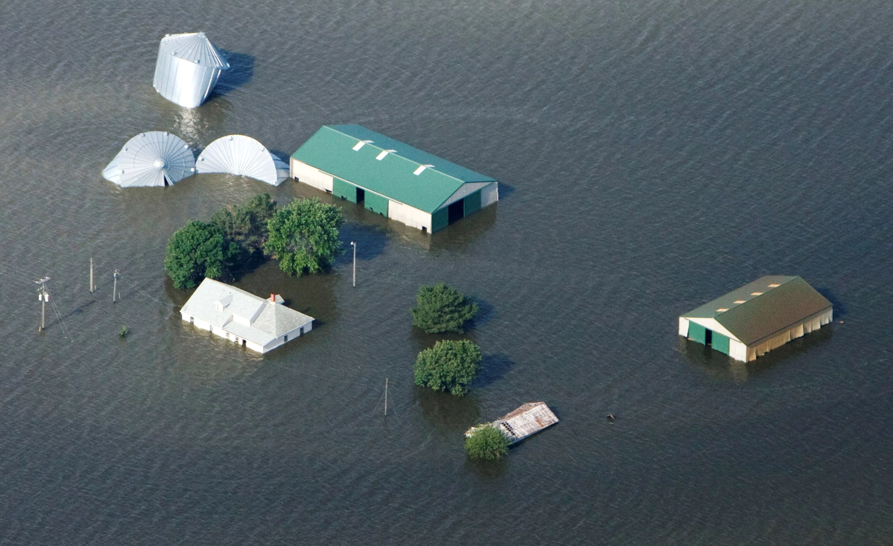 file-photo-an-aerial-view-of-a-farm-north-of-council-bluffs-iowa-submerged-in-missouri-river-flood-waters