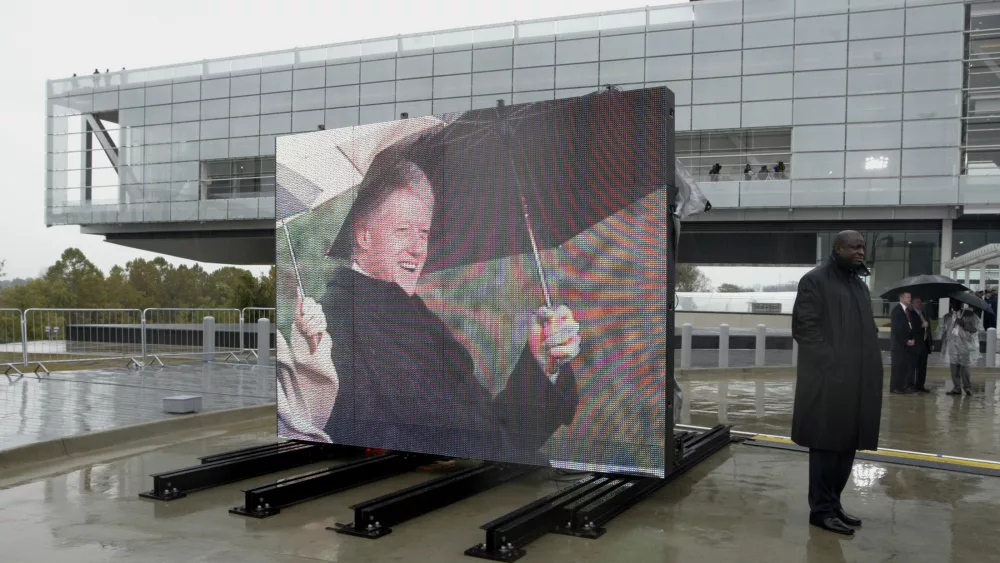 video-board-showing-clinton-with-library-in-background-during-dedication-ceremony-in-little-rock