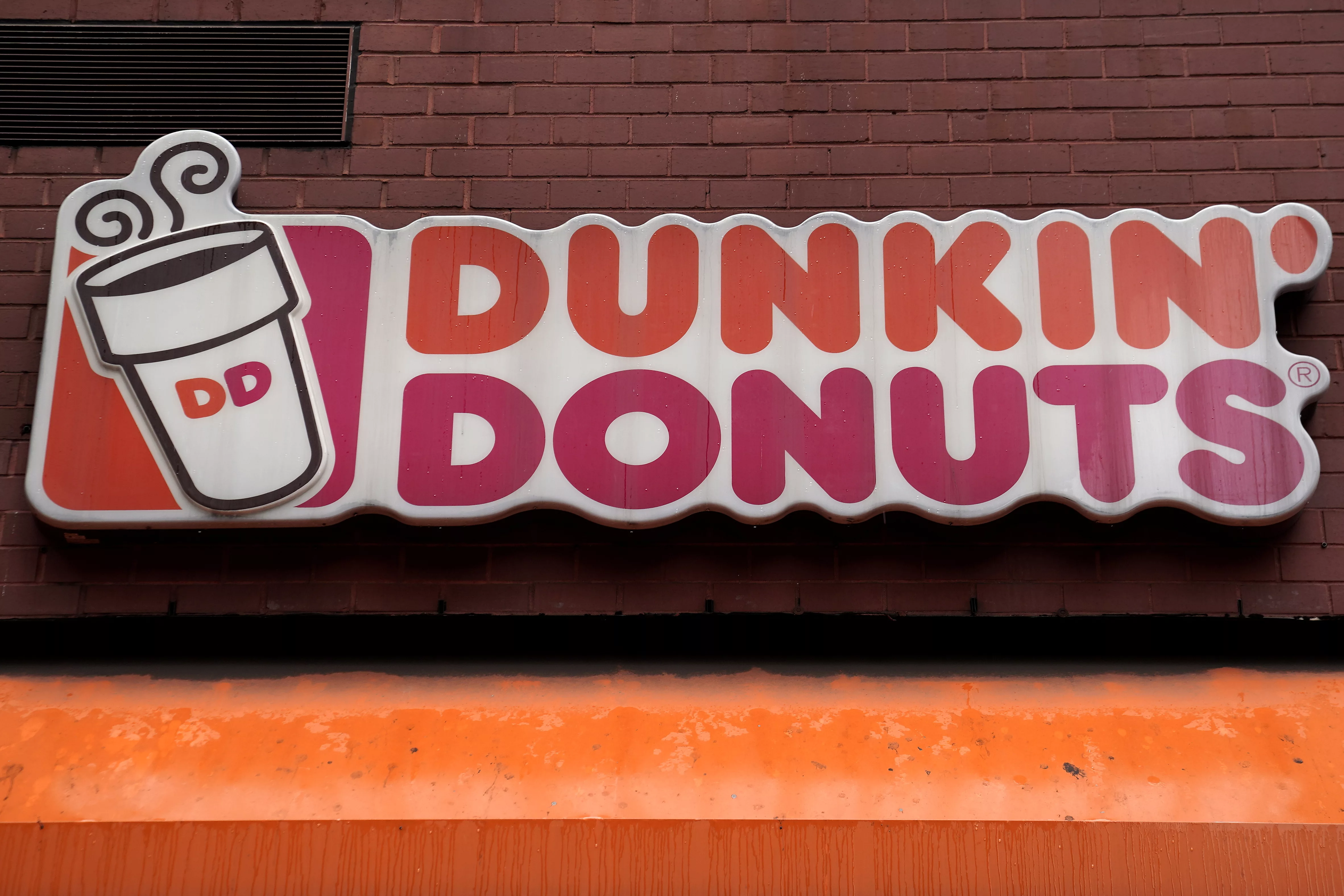 a-dunkin-donuts-logo-is-pictured