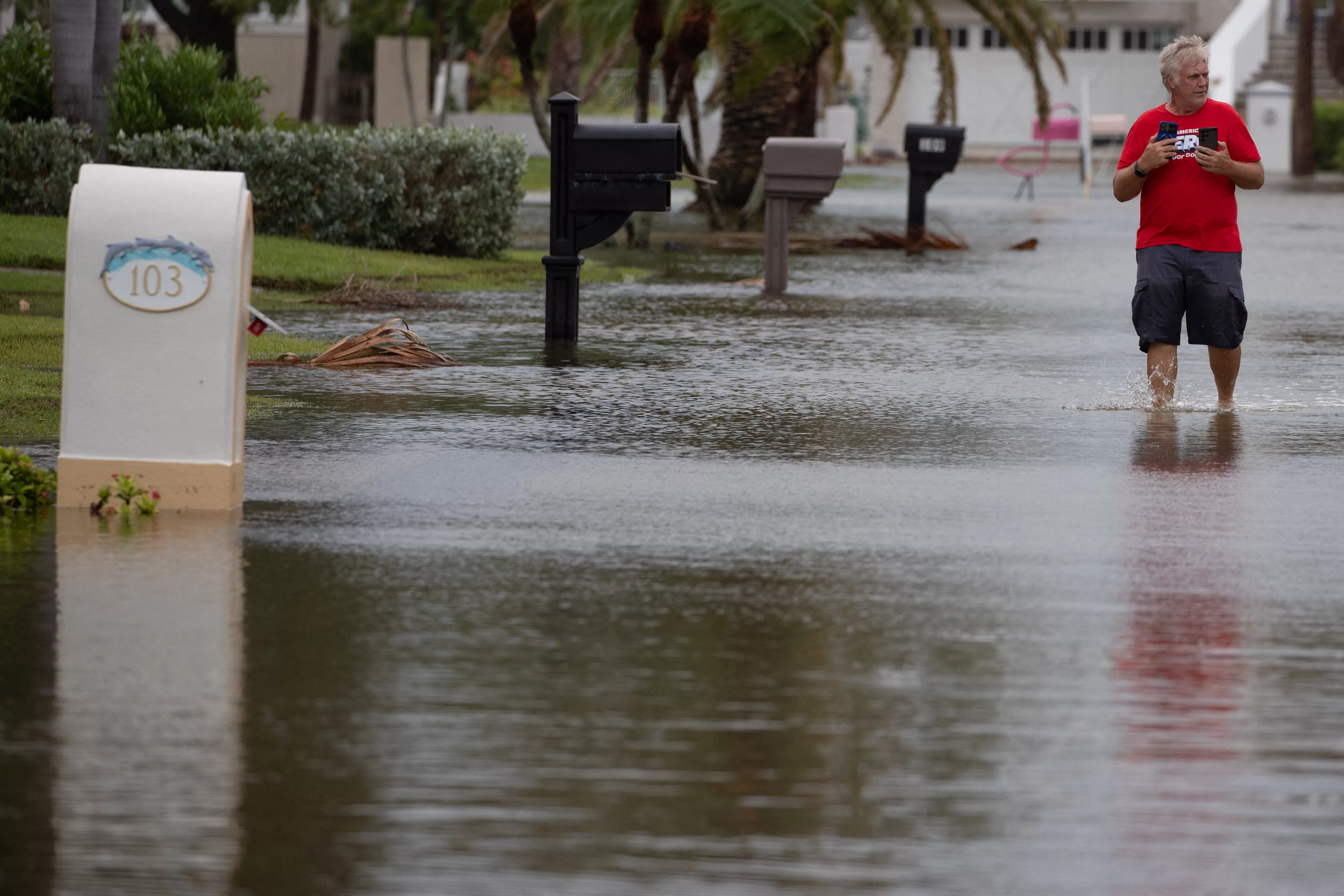 resident-surveys-flood-waters-from-hurricane-idalia-in-clearwater-beach-floridia