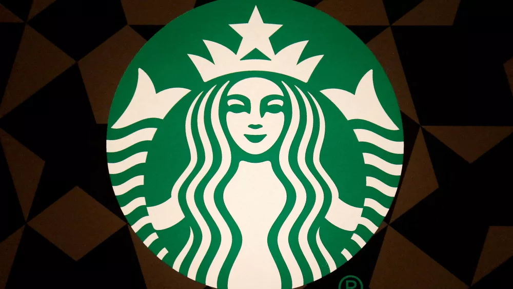 file-photo-a-starbucks-logo-is-pictured-on-the-door-of-the-green-apron-delivery-service-at-the-empire-state-building-in-new-york